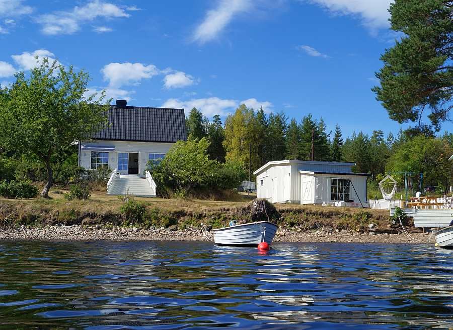 Ferienhaus Nabben direkt liegt direkt am Ufer des Hecht-Sees Bjørknessjøen